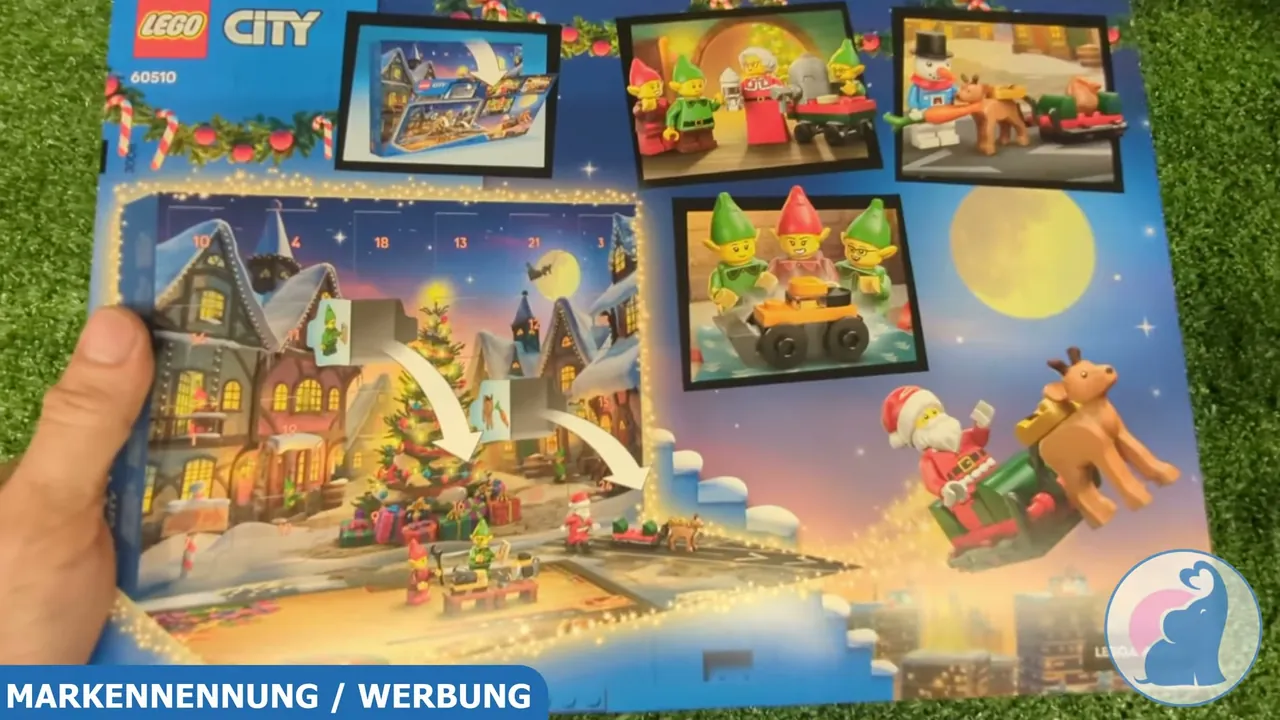 Die Rückseite zeigt die aufklappbare Box, die sich in eine winterliche Spielmatte für die fertigen Mini-Modelle verwandelt.