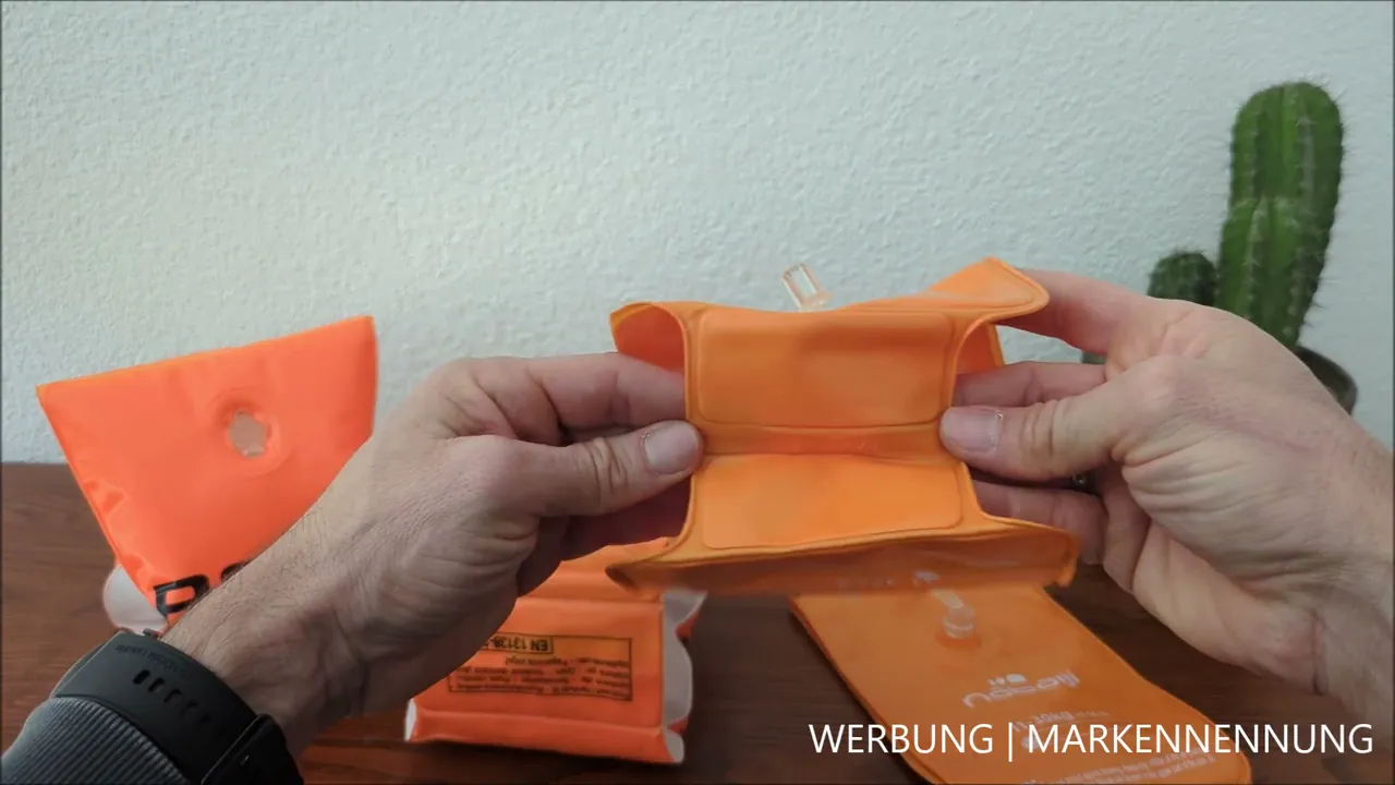 Meiner Meinung nach sollte man die Schwimmhilfen unbedingt vor dem Aufblasen überstreifen, damit das Anziehen leicht gelingt.