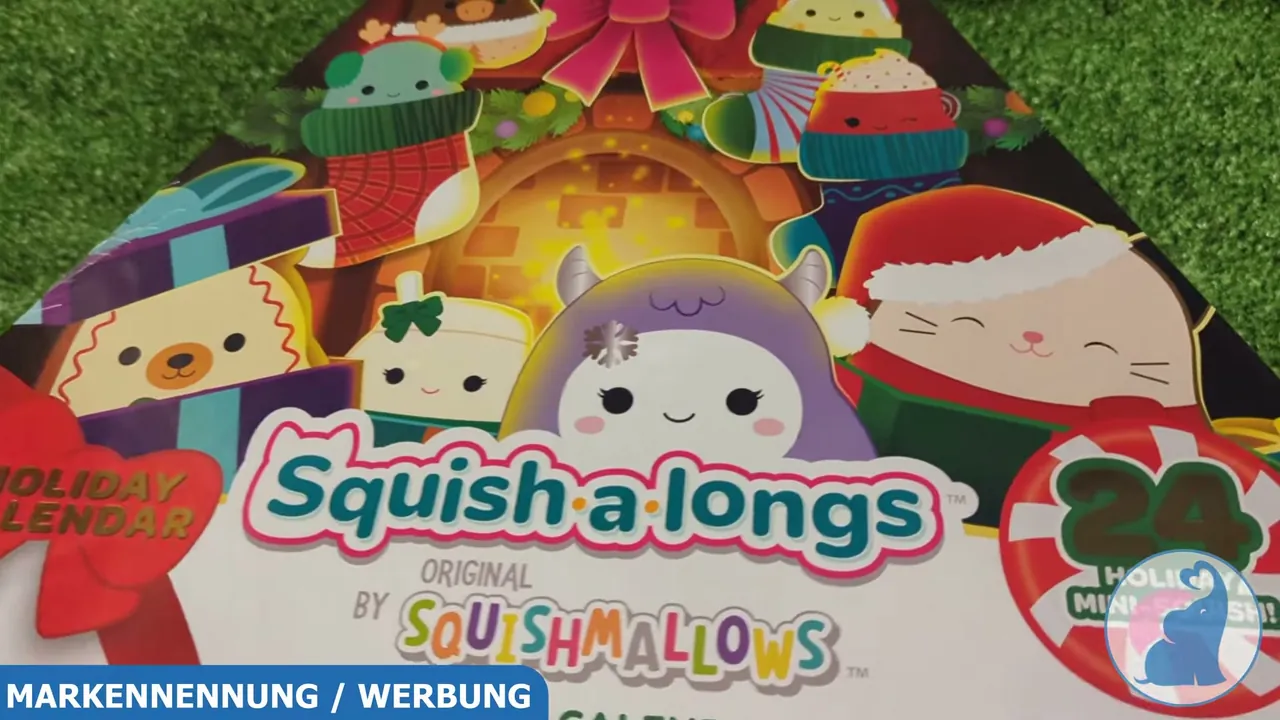 Die festlich gestaltete Schachtel zeigt beliebte Squishmallows-Charaktere im winterlichen Weihnachtslook.